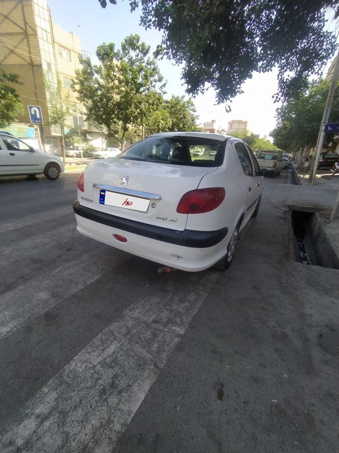 پژو ۲۰۶ صندوق دار v2 - 1390