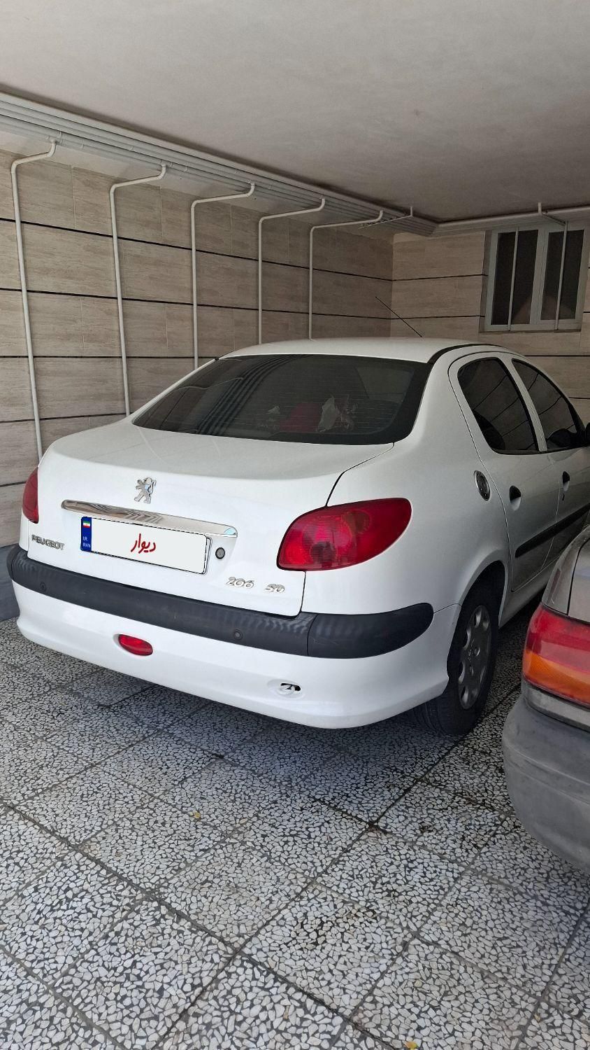 پژو ۲۰۶ صندوق دار v8 - 1394