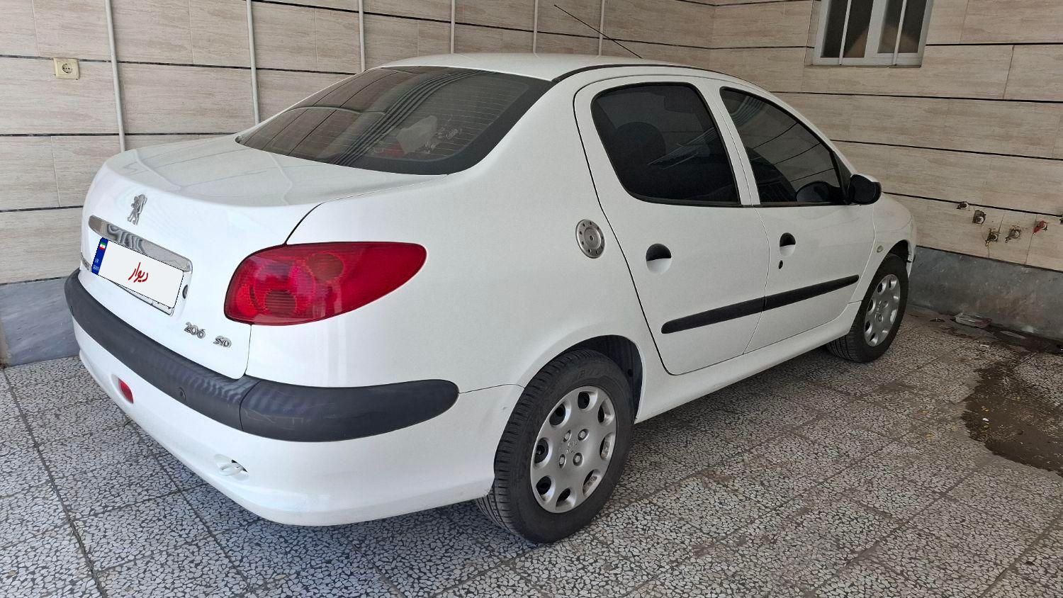 پژو ۲۰۶ صندوق دار v8 - 1394