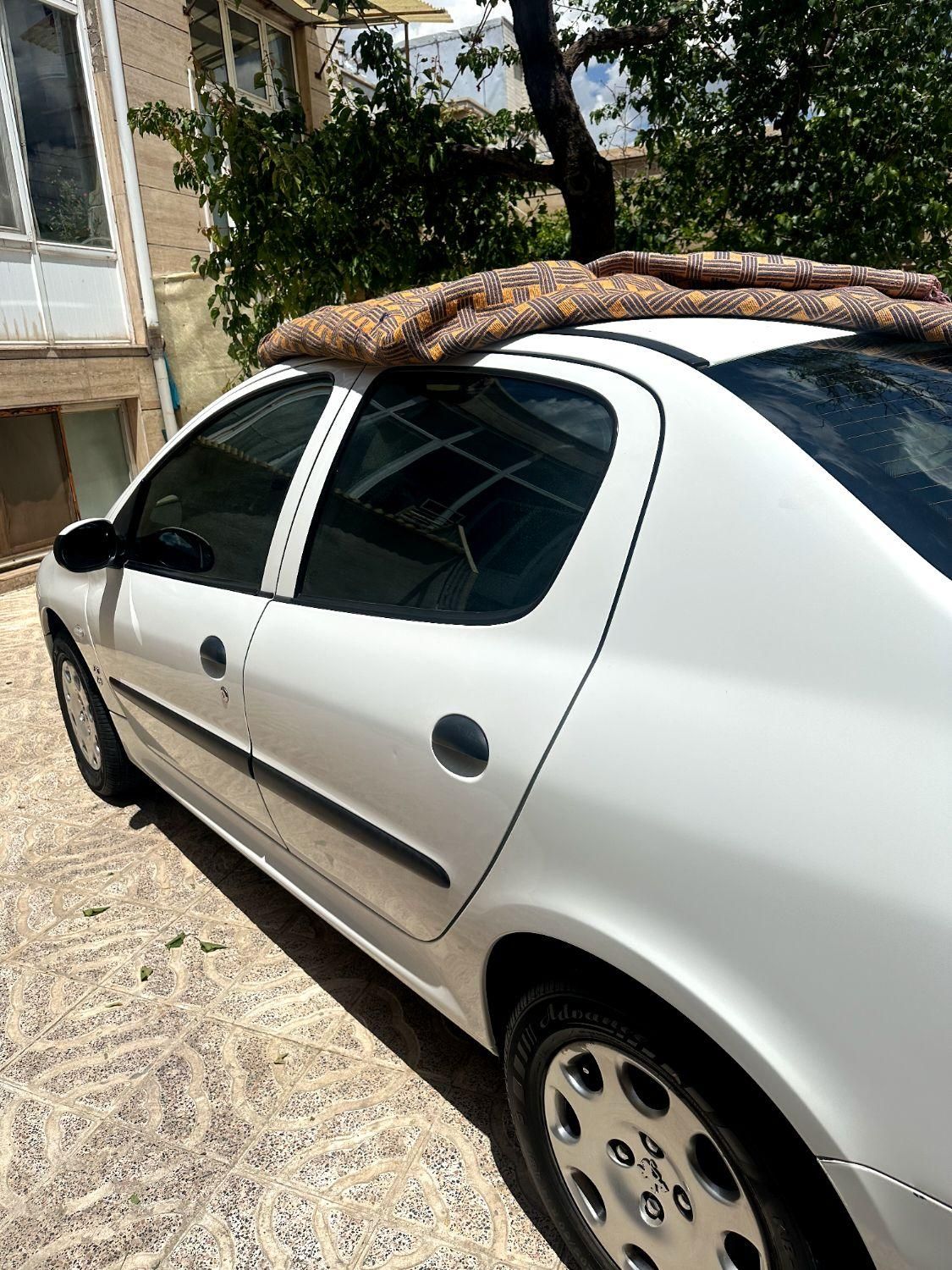 پژو ۲۰۶ صندوق دار v8 - 1395