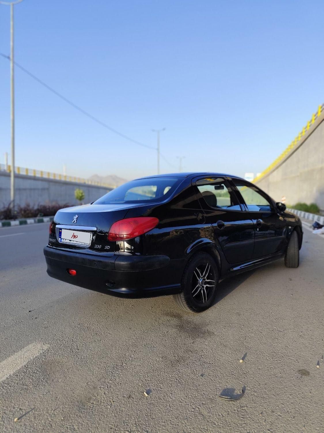 پژو ۲۰۶ صندوق دار v8 - 1395