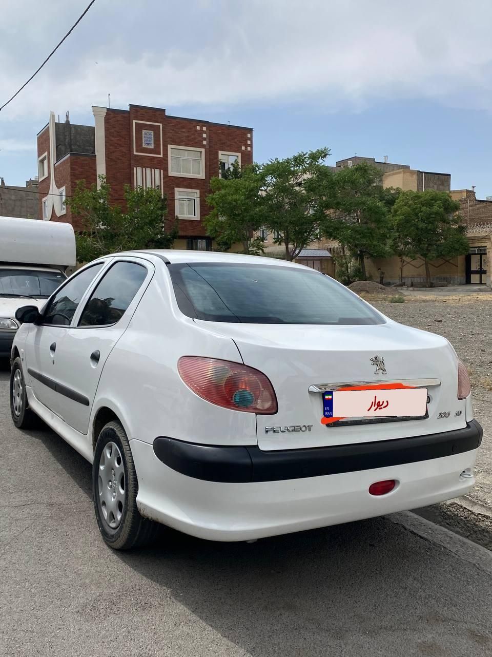 پژو ۲۰۶ صندوق دار v8 - 1396