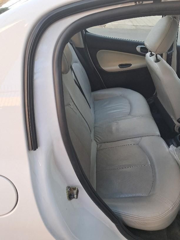 پژو ۲۰۶ صندوق دار v8 - 1390