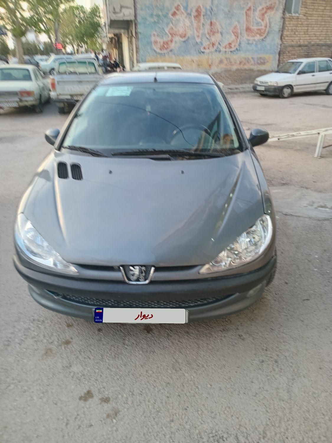 پژو ۲۰۶ صندوق دار v6 - 1394