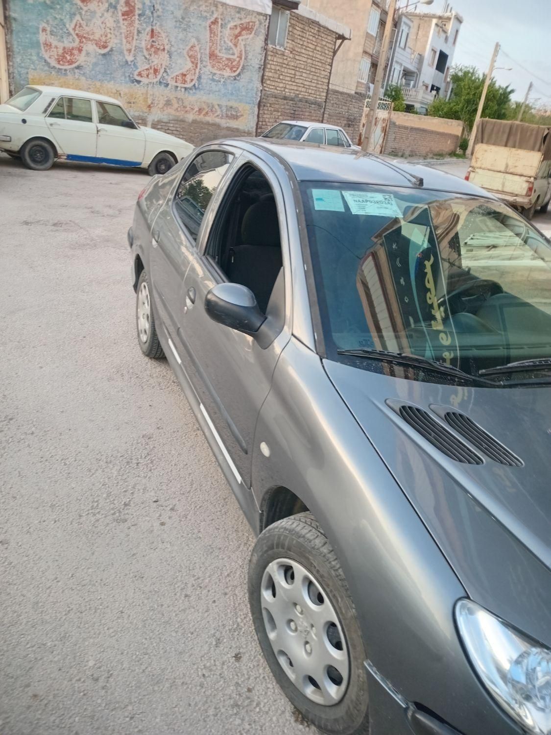 پژو ۲۰۶ صندوق دار v6 - 1394