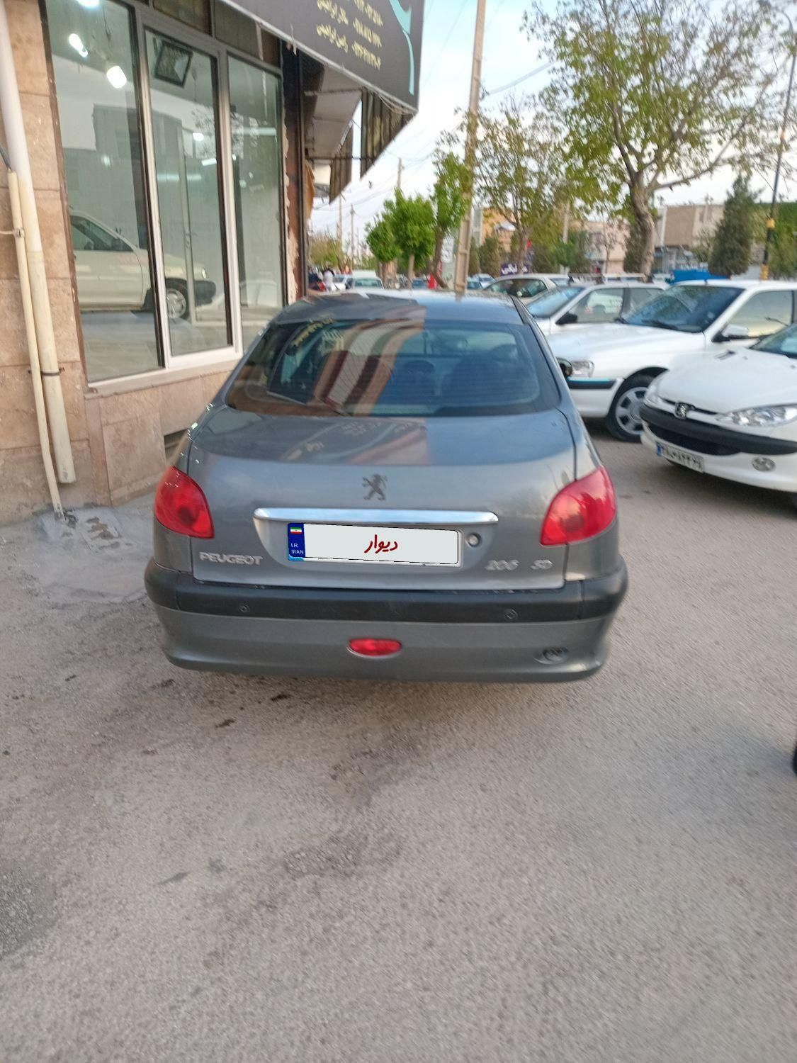 پژو ۲۰۶ صندوق دار v6 - 1394