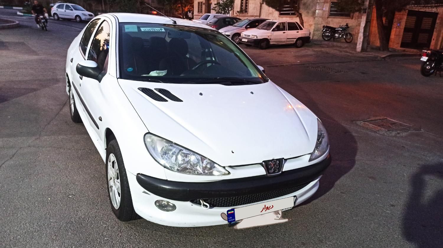 پژو ۲۰۶ صندوق دار v8 - 1396
