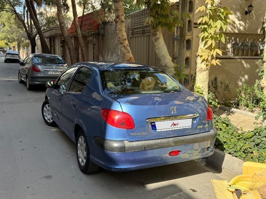 پژو ۲۰۶ صندوق دار v8 - 1394