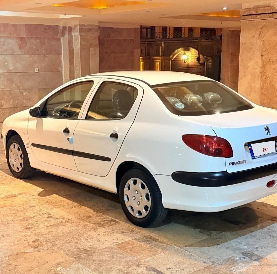 پژو ۲۰۶ صندوق دار v8 - 1396