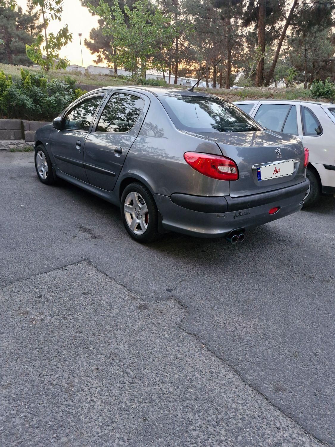 پژو ۲۰۶ صندوق دار v8 - 1395