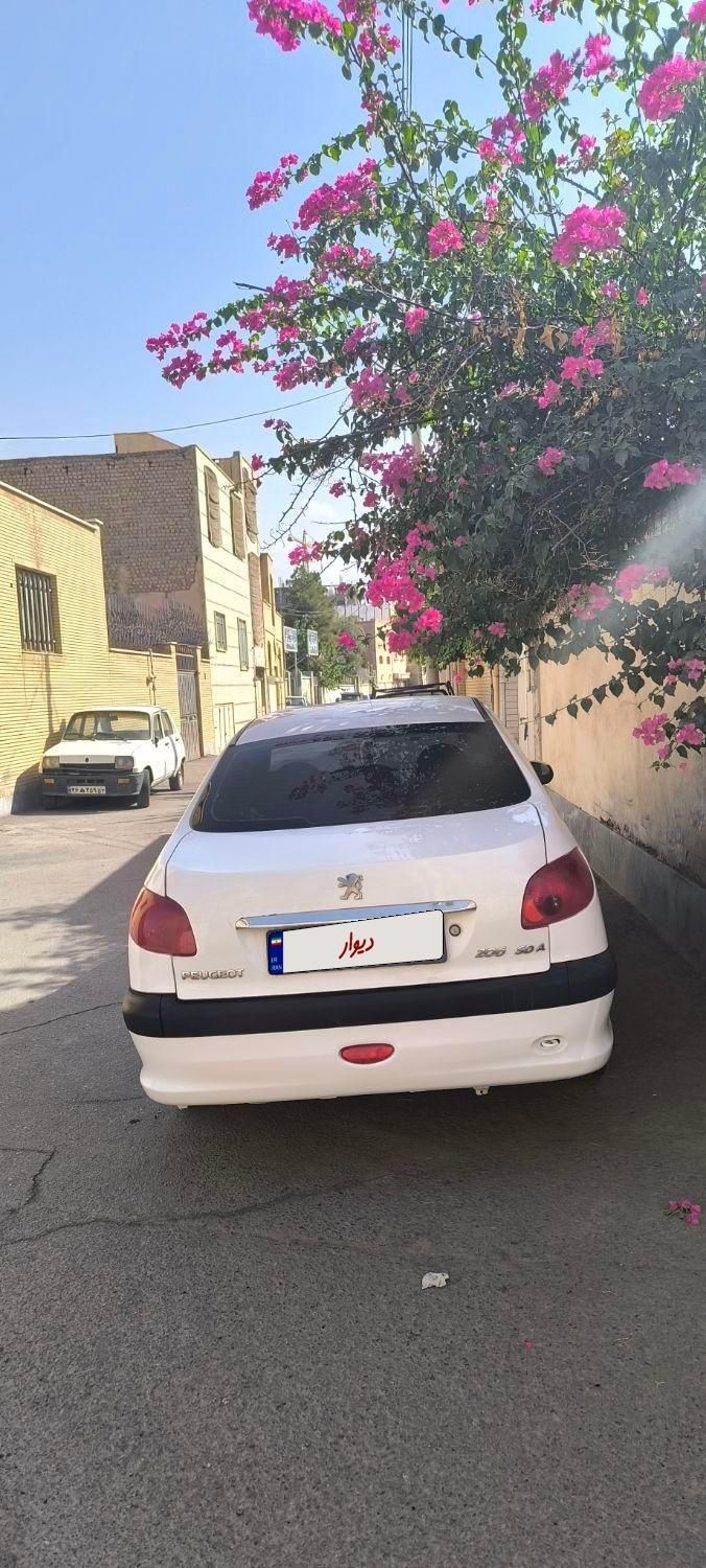 پژو ۲۰۶ صندوق دار v8 - 1389