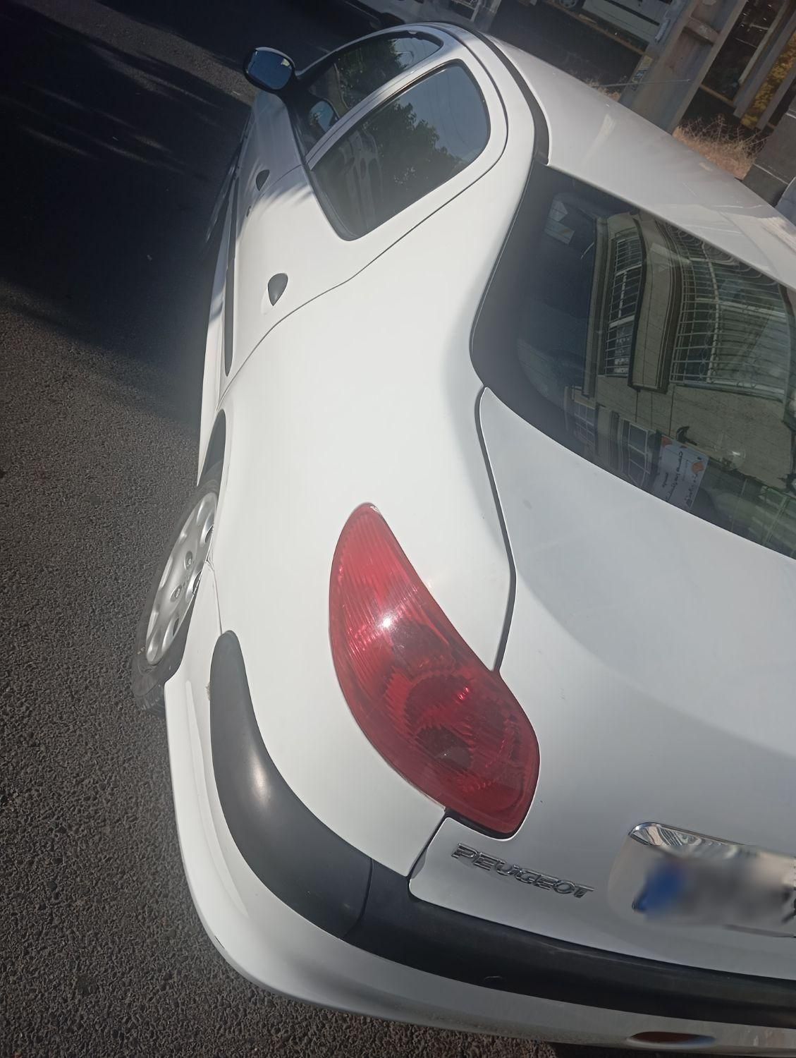 پژو ۲۰۶ صندوق دار v8 - 1392