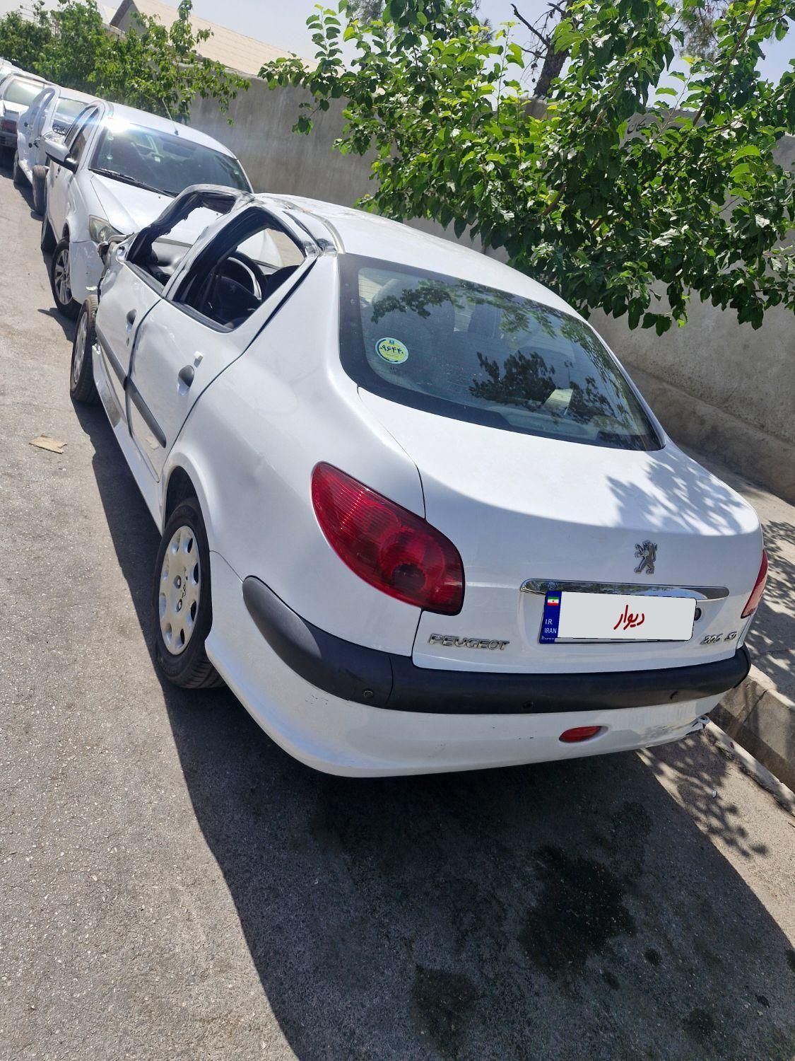 پژو ۲۰۶ صندوق دار v8 - 1398