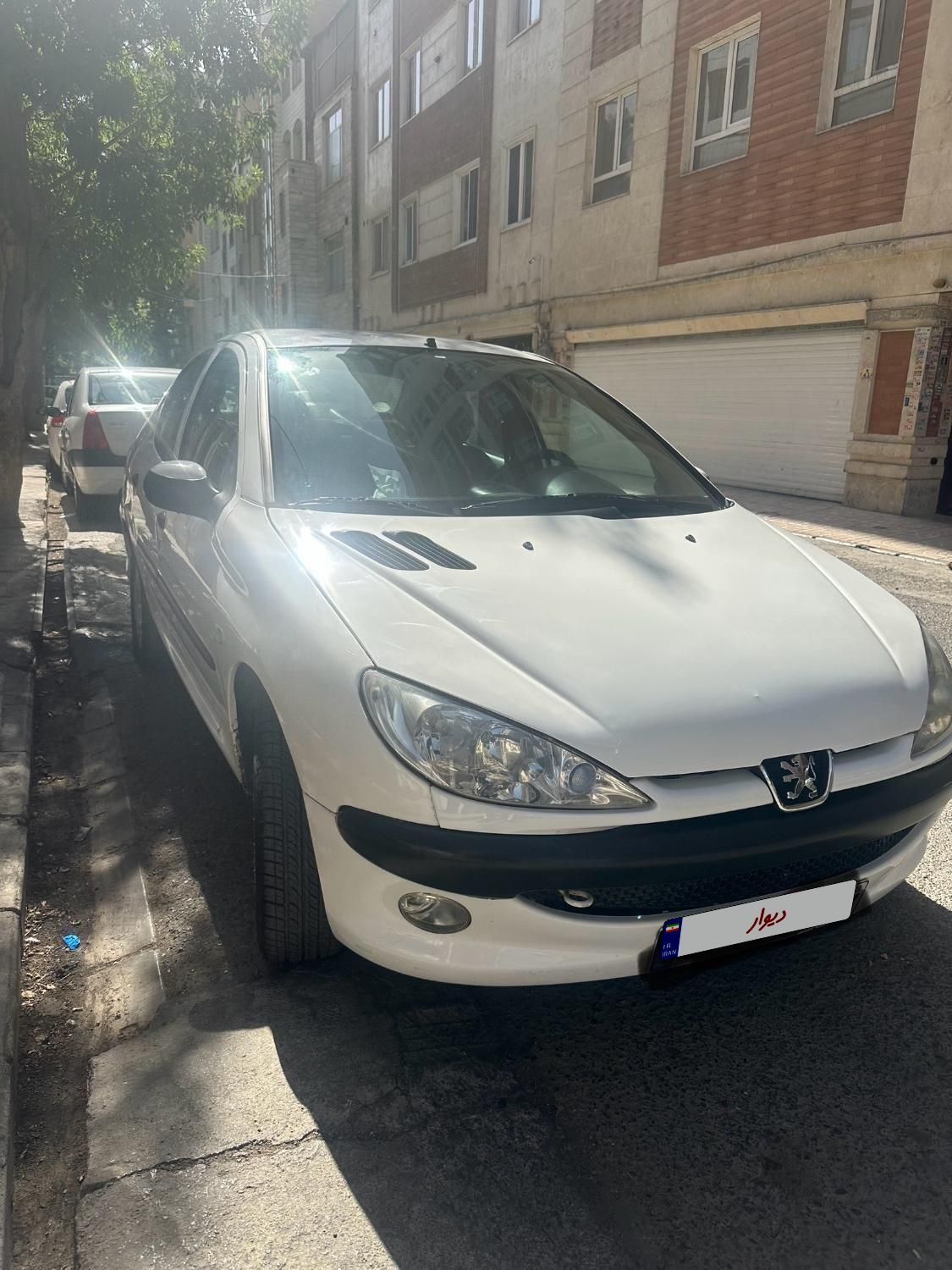 پژو ۲۰۶ صندوق دار v8 - 1397