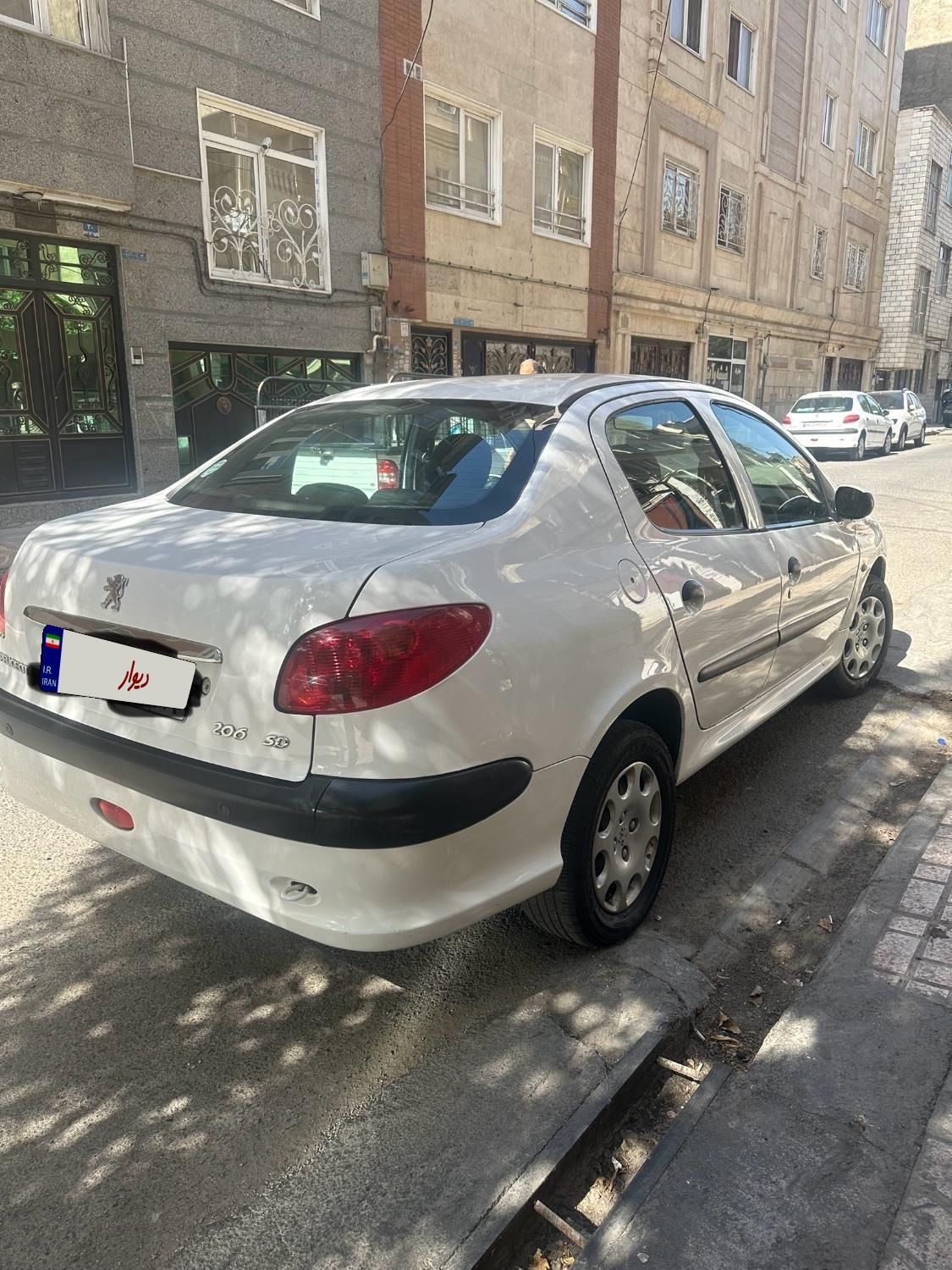 پژو ۲۰۶ صندوق دار v8 - 1397