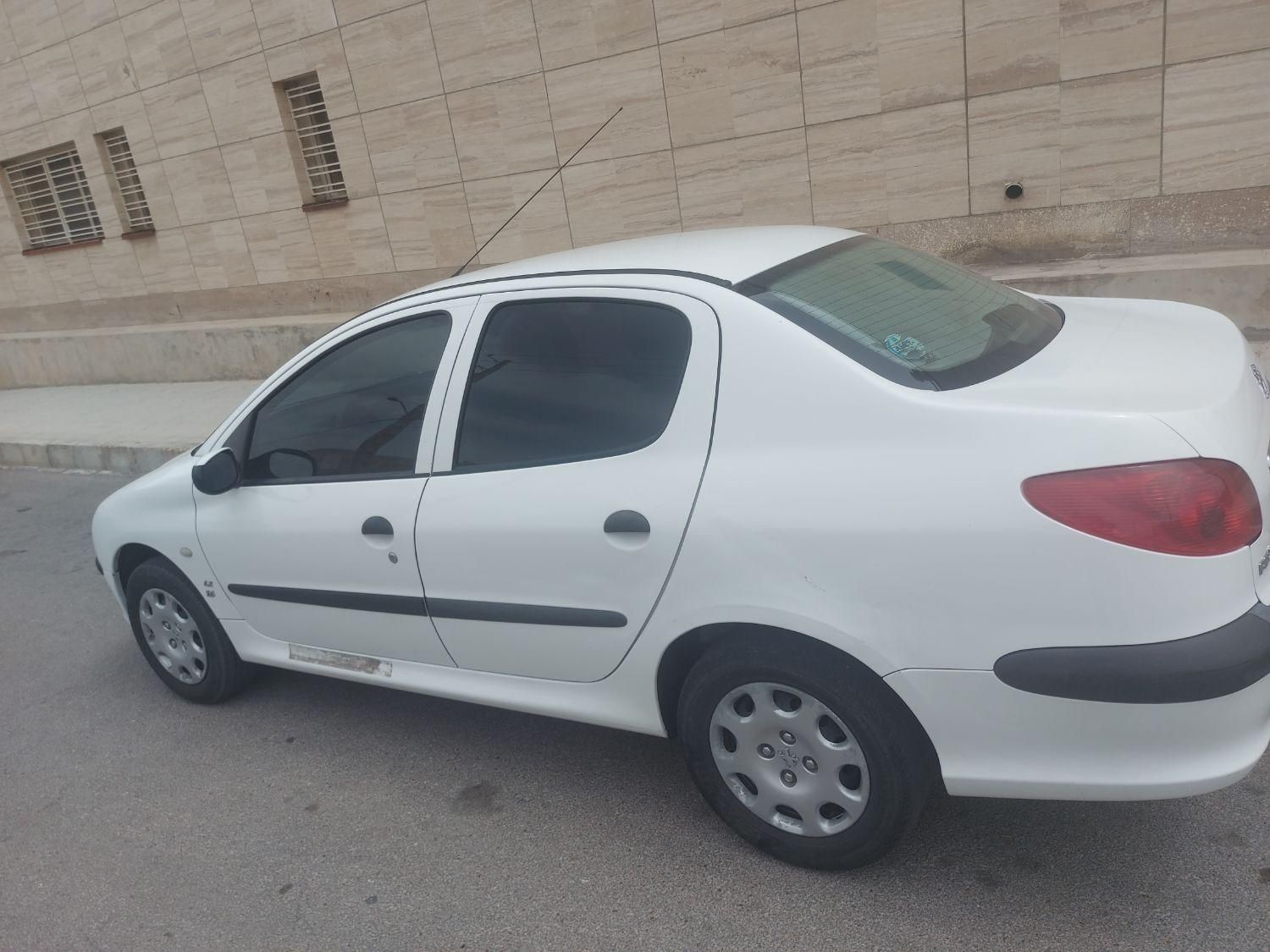 پژو ۲۰۶ صندوق دار v8 - 1399