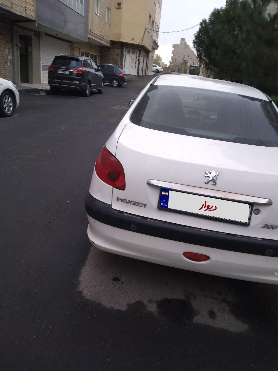 پژو ۲۰۶ صندوق دار v8 - 1397