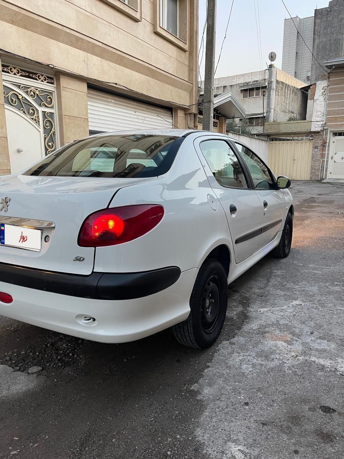 پژو ۲۰۶ صندوق دار v8 - 1394