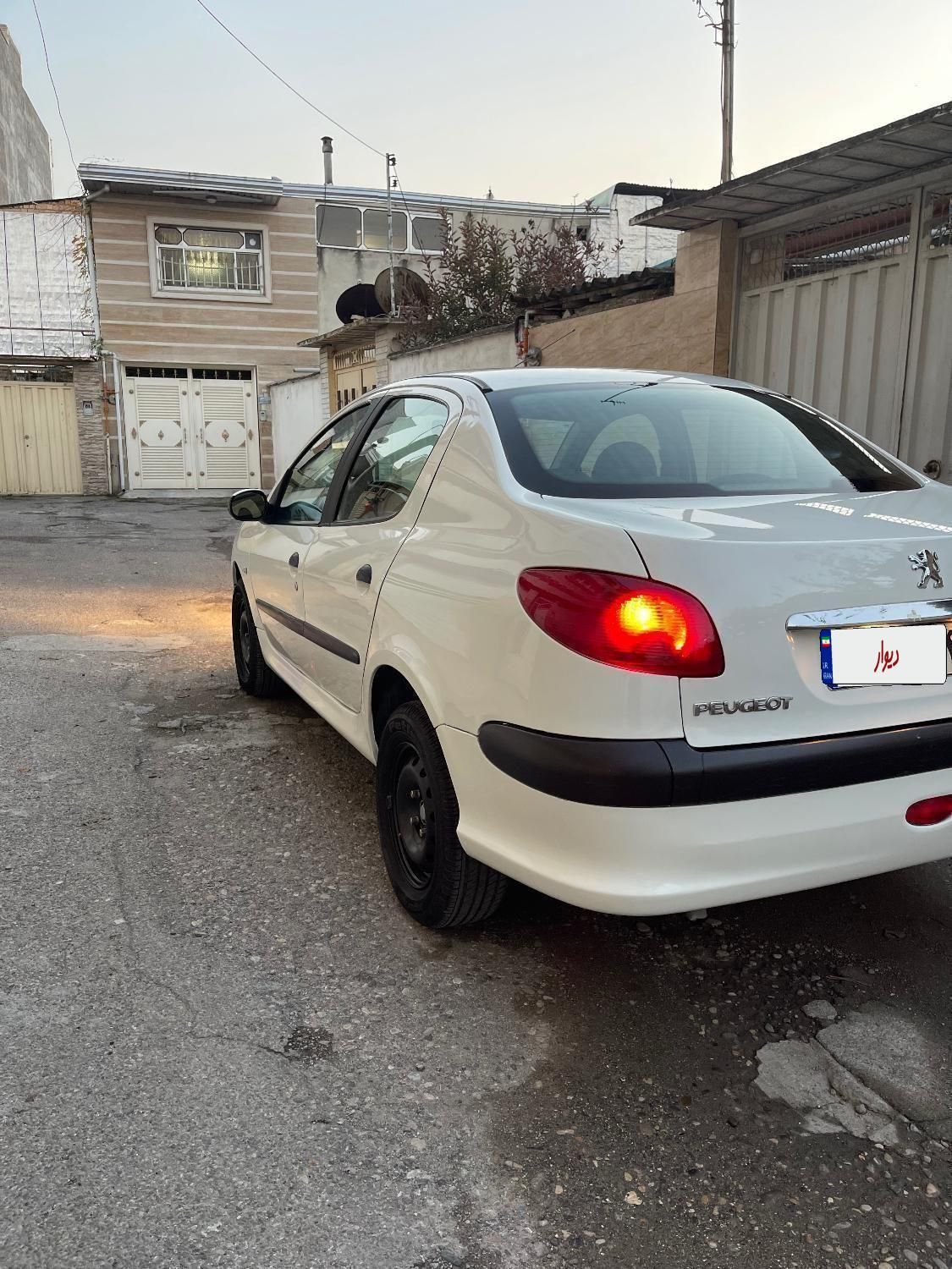 پژو ۲۰۶ صندوق دار v8 - 1394