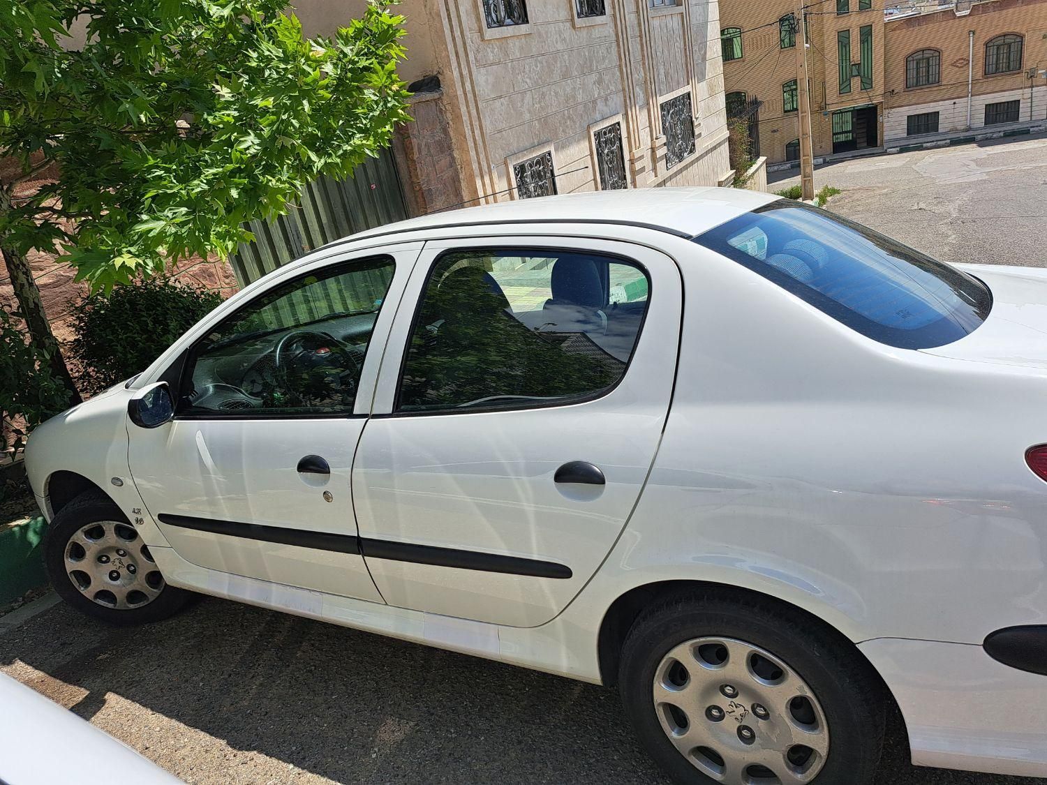 پژو ۲۰۶ صندوق دار v8 - 1397