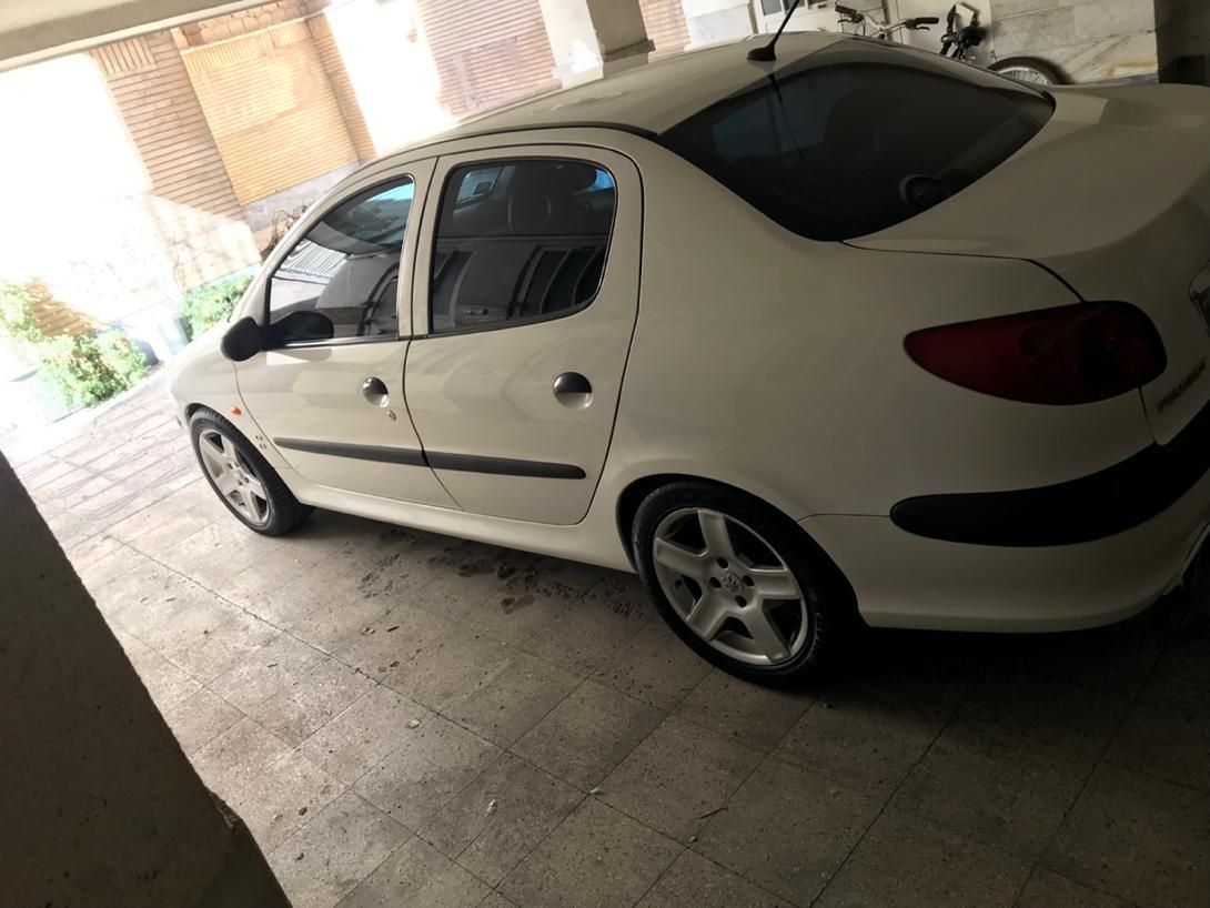 پژو ۲۰۶ صندوق دار v8 - 1396