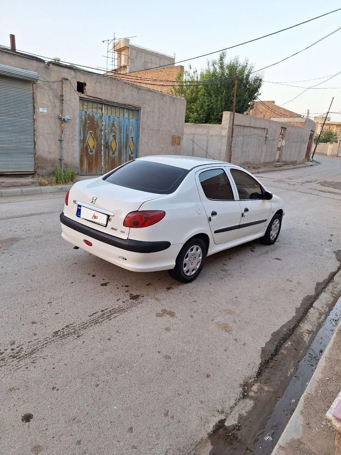 پژو ۲۰۶ صندوق دار v8 - 1394