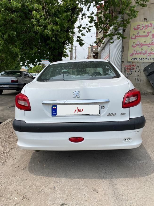 پژو ۲۰۶ صندوق دار v8 - 1394