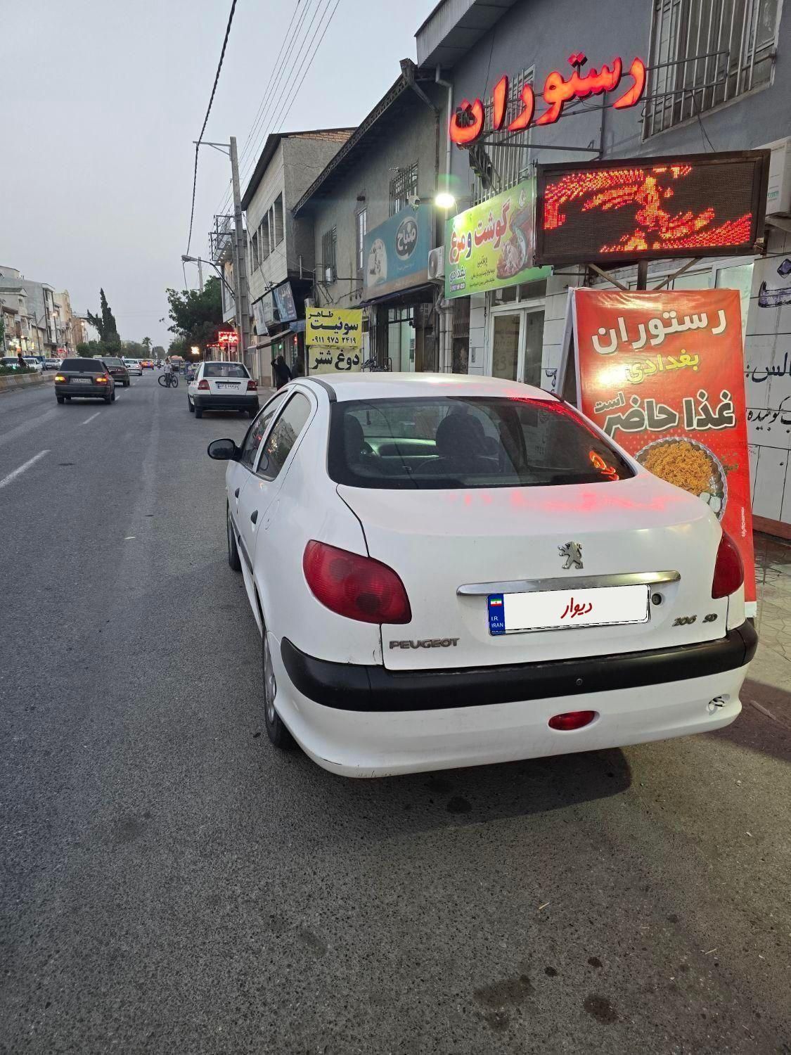 پژو ۲۰۶ صندوق دار v2 - 1391
