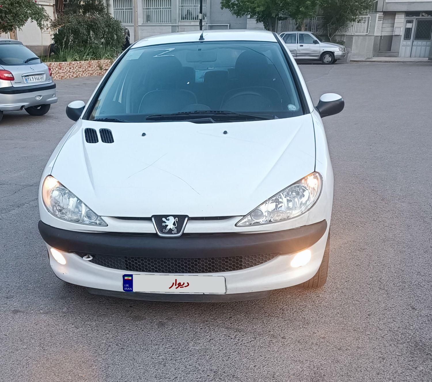 پژو ۲۰۶ صندوق دار v8 - 1396