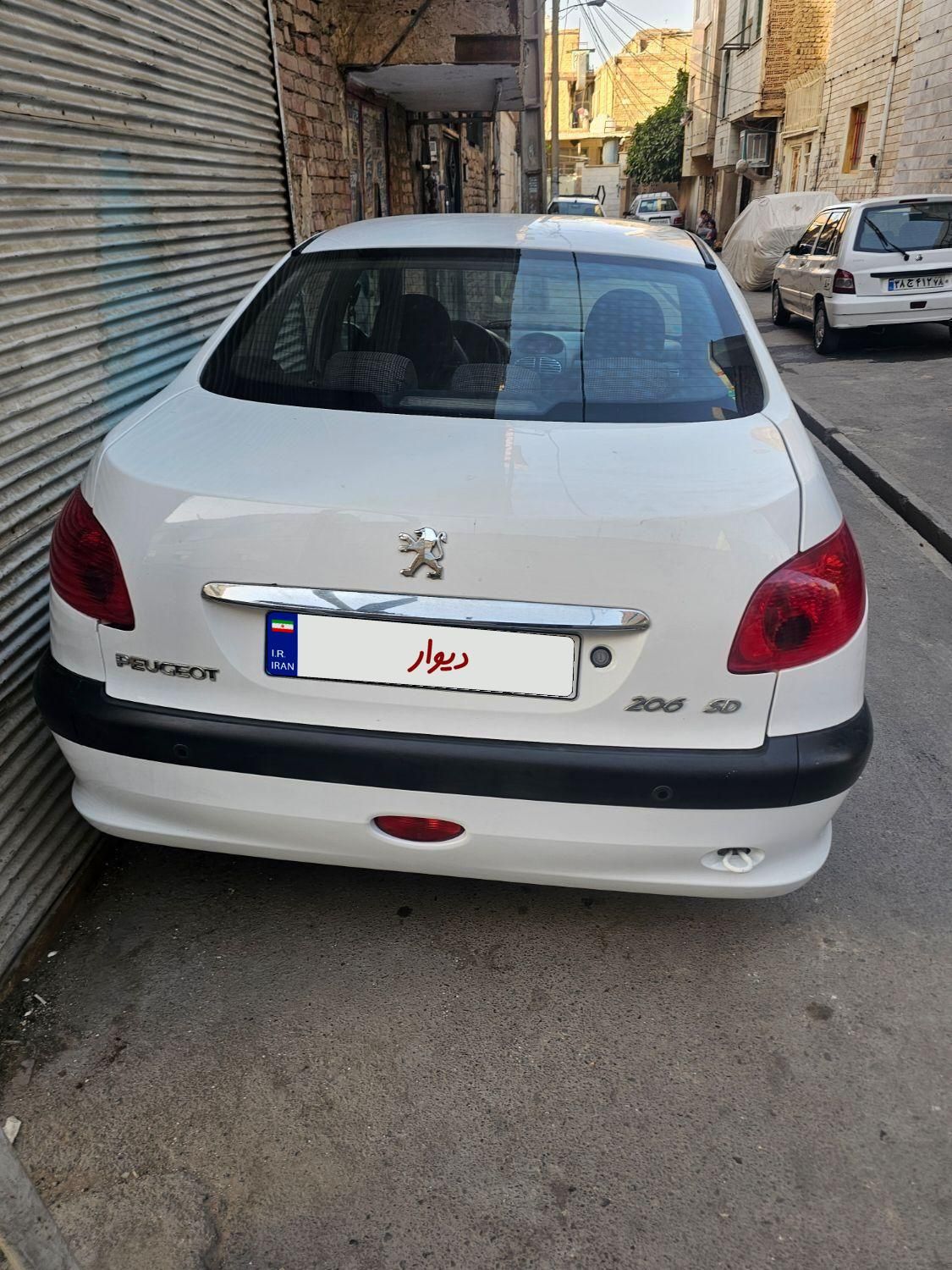 پژو ۲۰۶ صندوق دار v8 - 1396