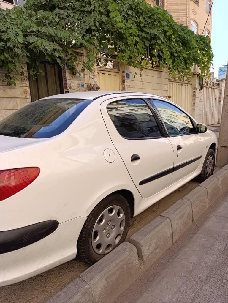 پژو ۲۰۶ صندوق دار v8 - 1391