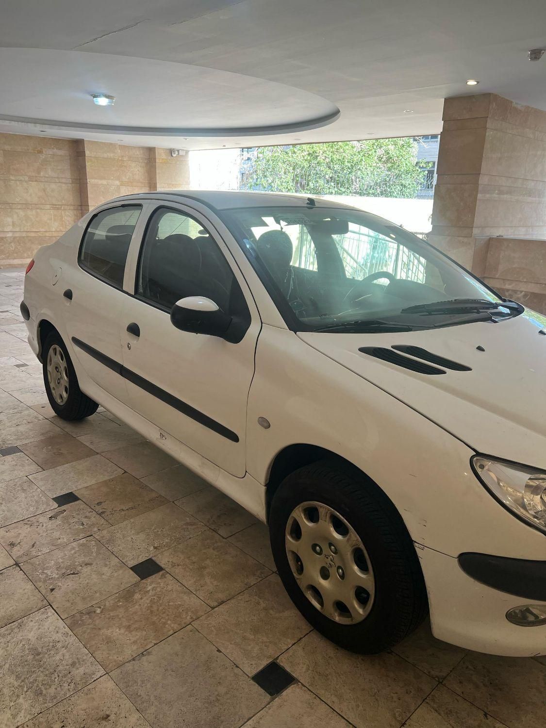 پژو ۲۰۶ صندوق دار v8 - 1399