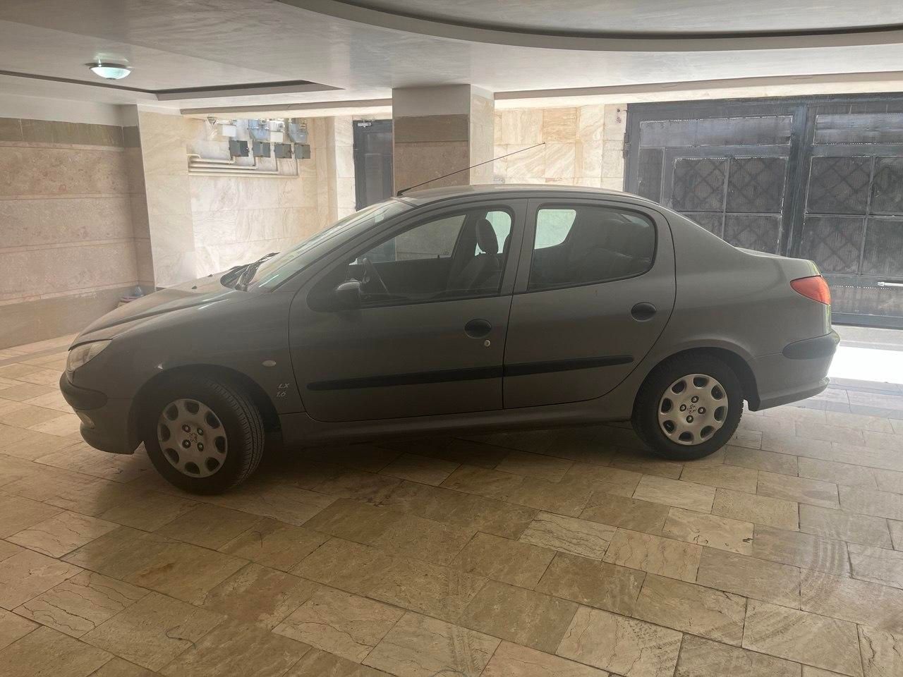 پژو ۲۰۶ صندوق دار v8 - 1396