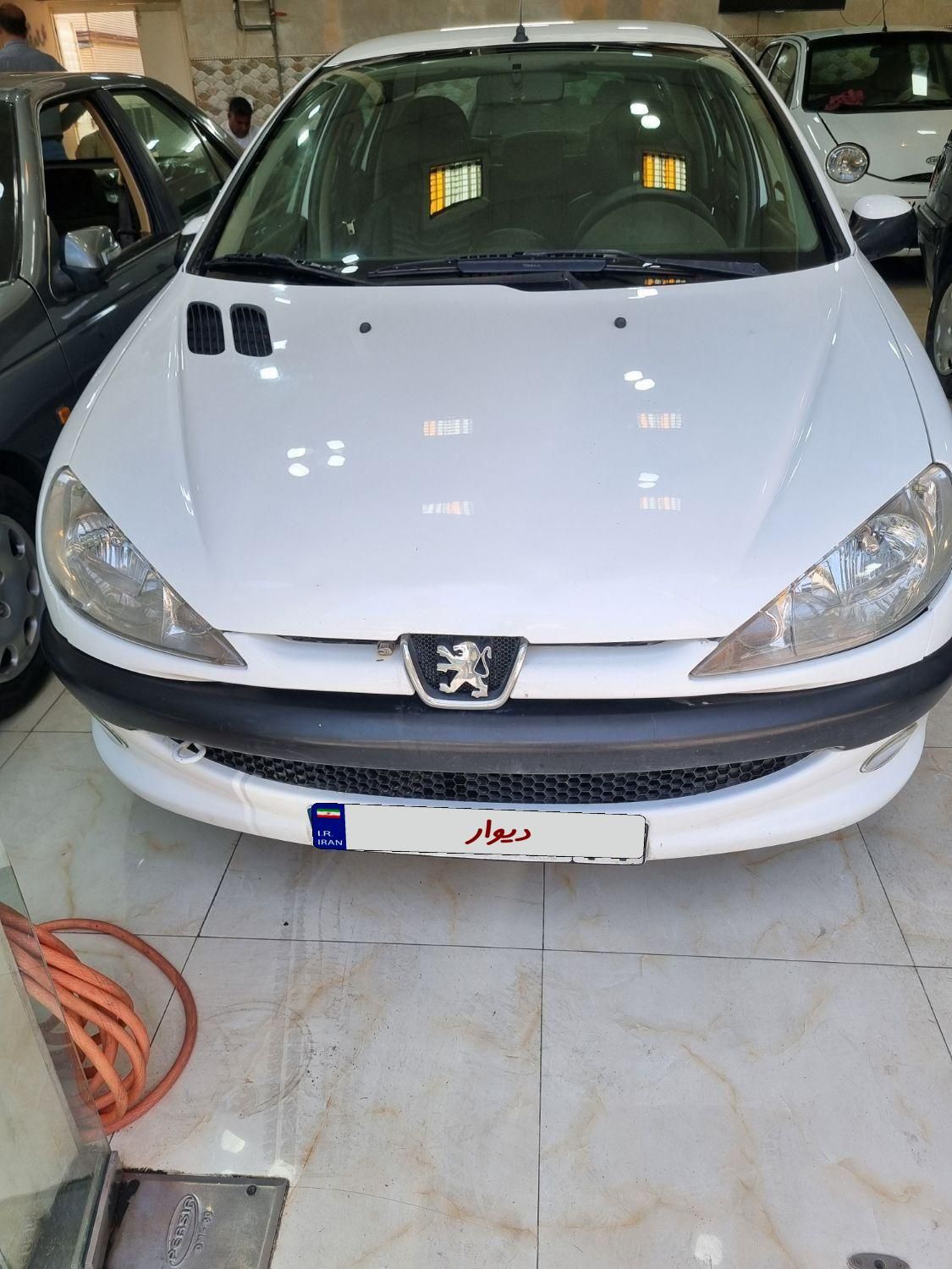 پژو ۲۰۶ صندوق دار v8 - 1397