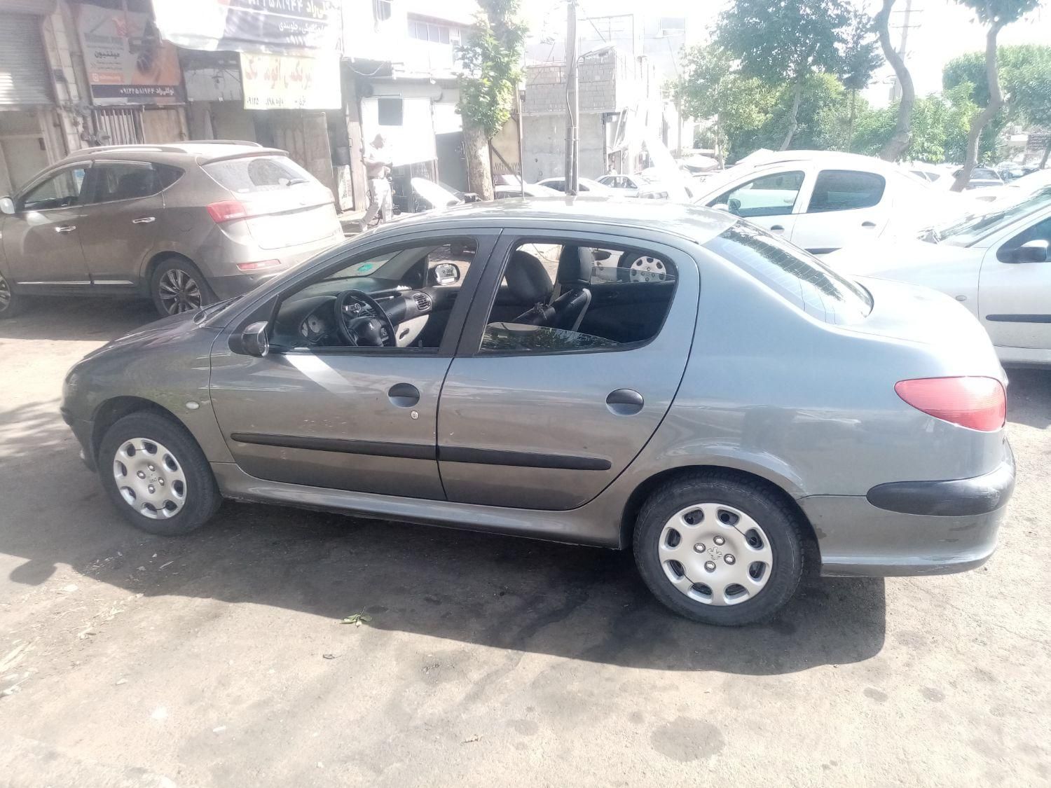 پژو ۲۰۶ صندوق دار v8 - 1390