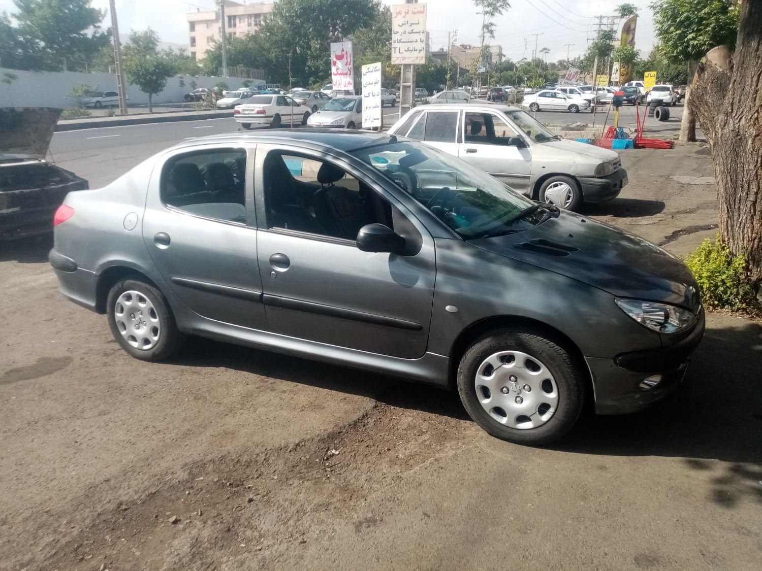 پژو ۲۰۶ صندوق دار v8 - 1390
