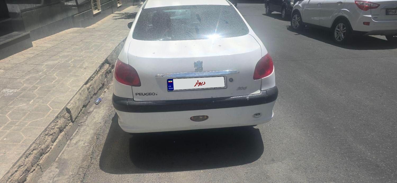 پژو ۲۰۶ صندوق دار v8 - 1390