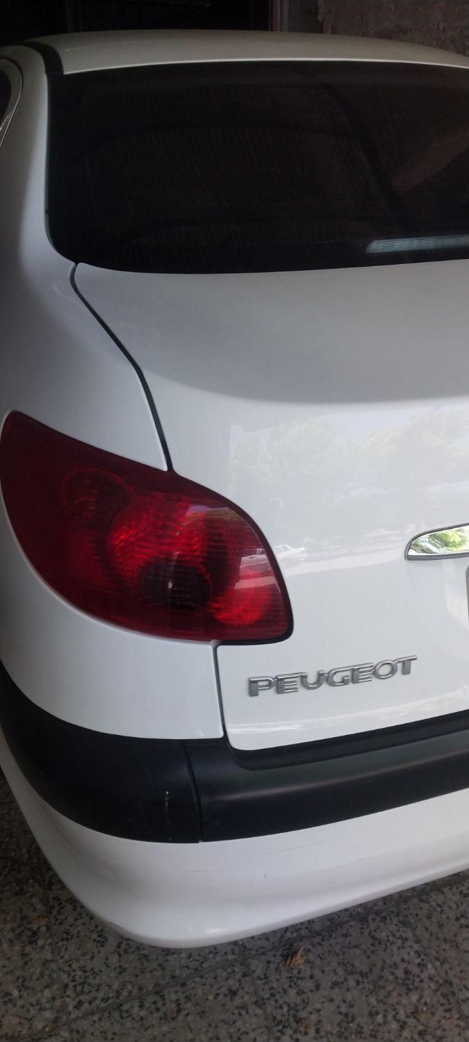 پژو ۲۰۶ صندوق دار v8 - 1400