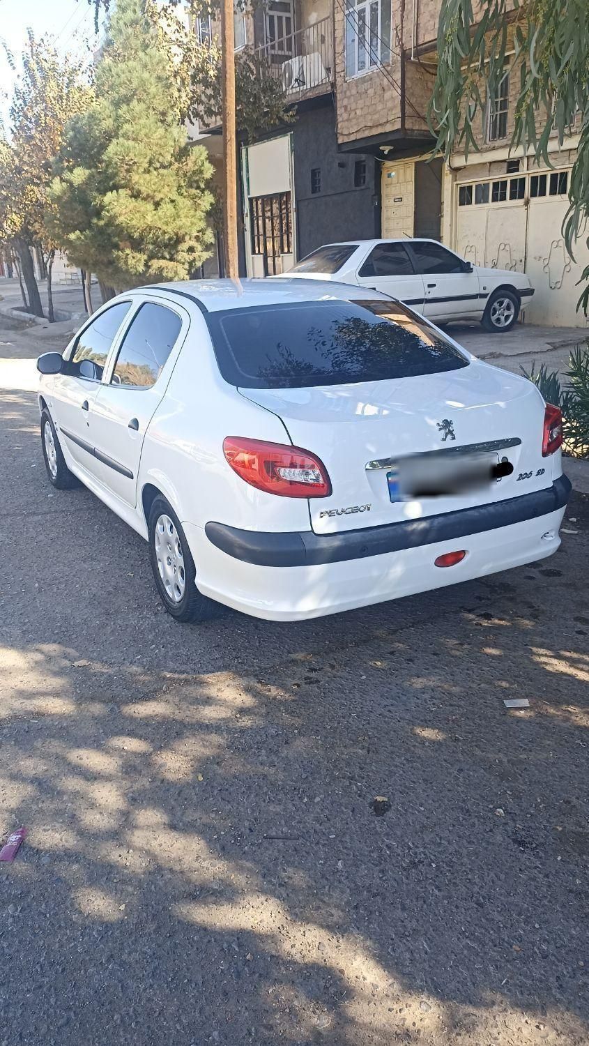 پژو ۲۰۶ صندوق دار v8 - 1397