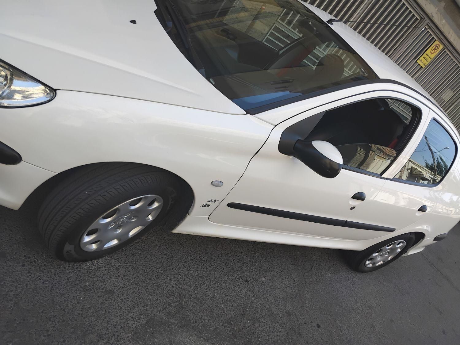 پژو ۲۰۶ صندوق دار v8 - 1394