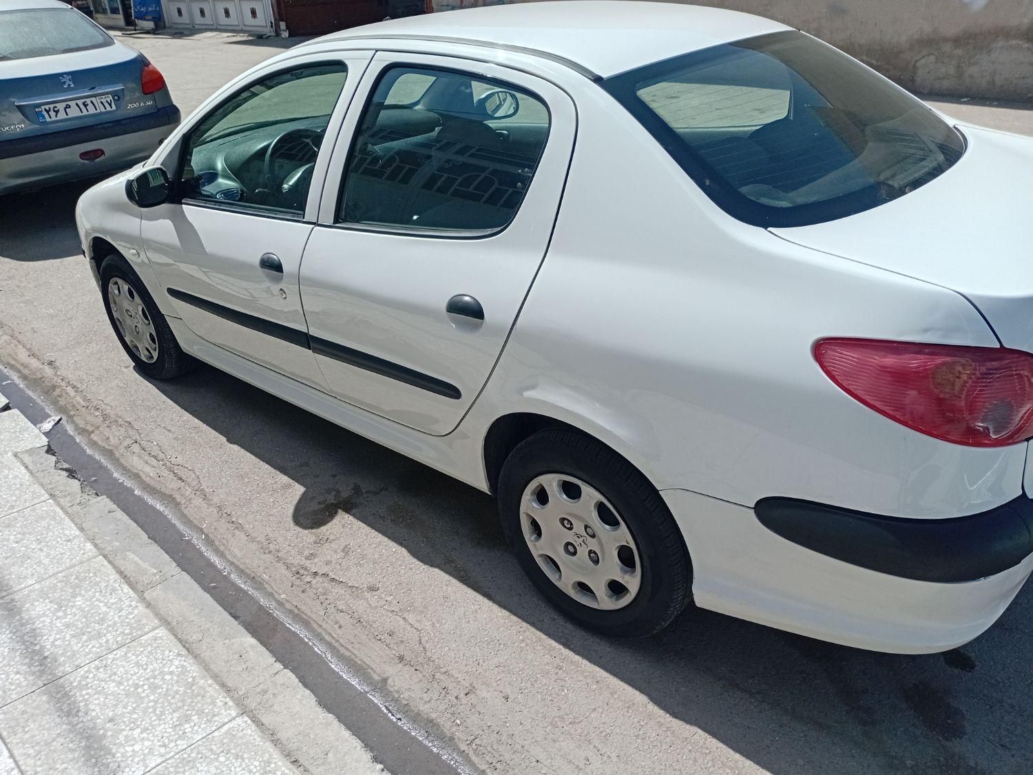 پژو ۲۰۶ صندوق دار v8 - 1395