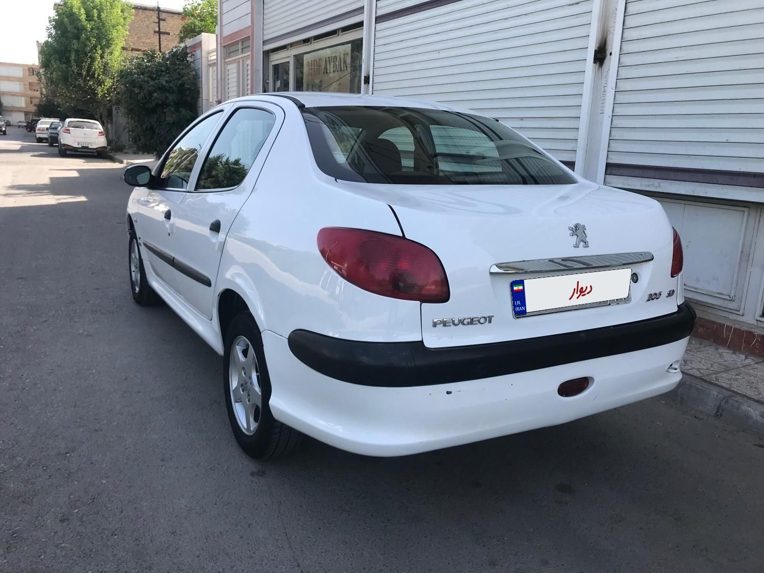 پژو ۲۰۶ صندوق دار v8 - 1396