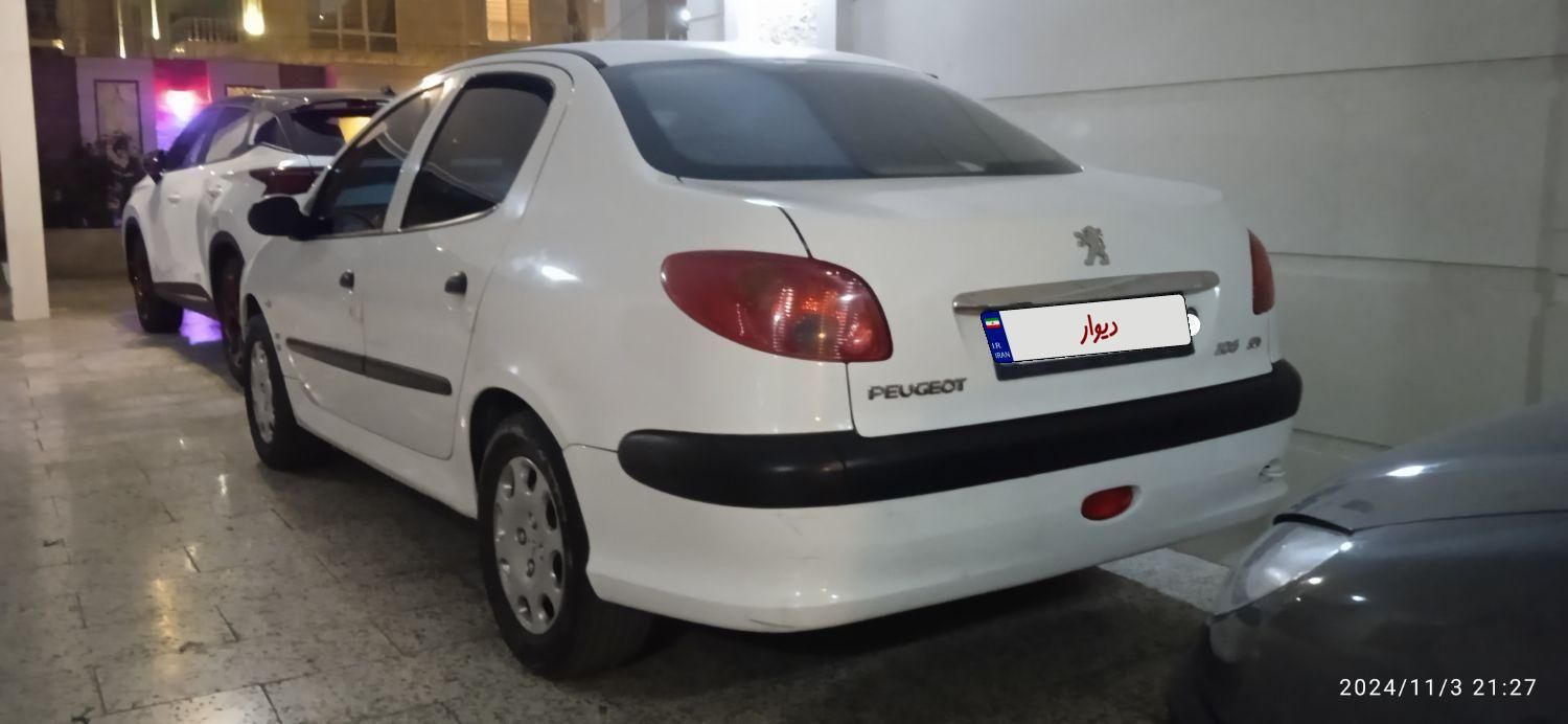 پژو ۲۰۶ صندوق دار v8 - 1395
