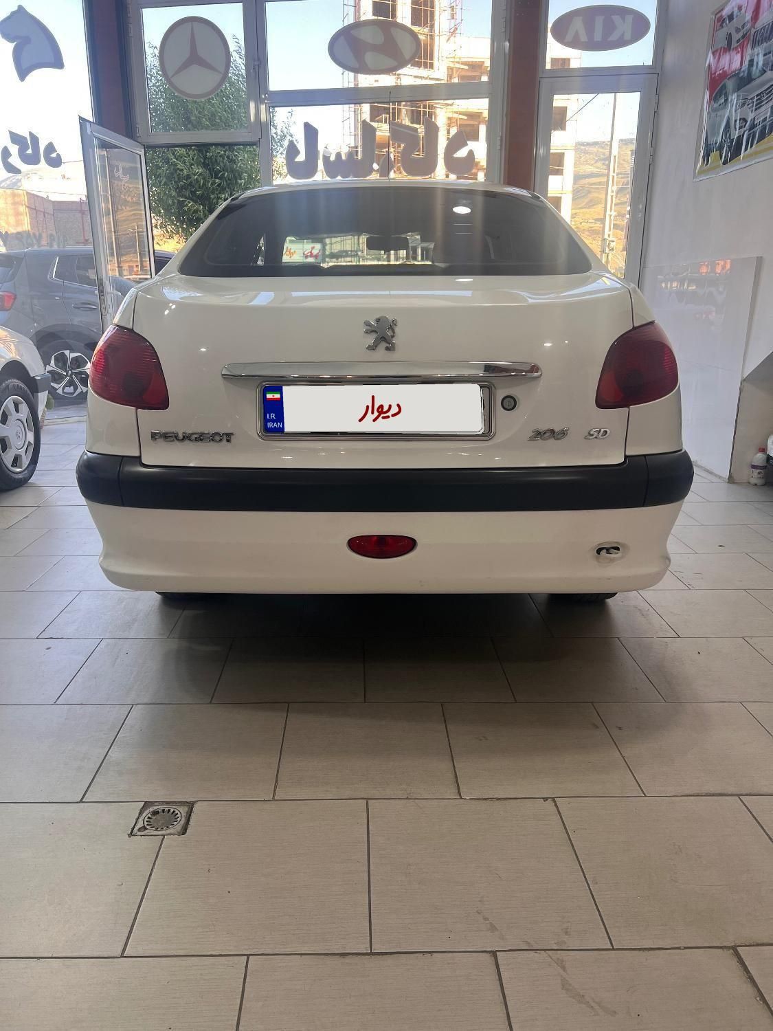 پژو ۲۰۶ صندوق دار v8 - 1399