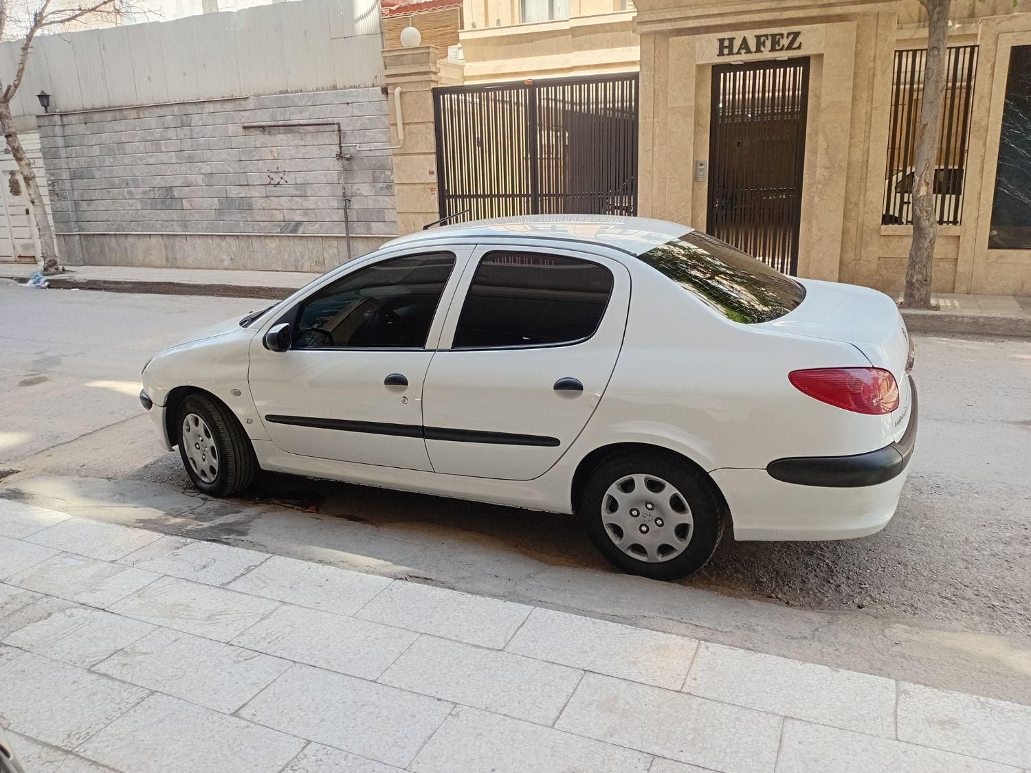 پژو ۲۰۶ صندوق دار v8 - 1395