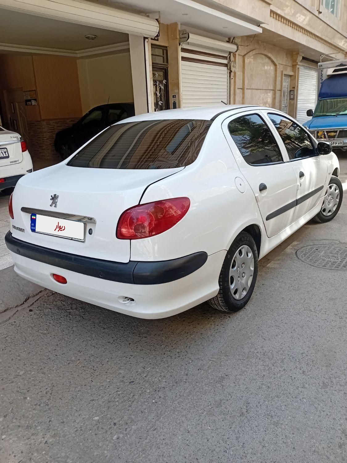 پژو ۲۰۶ صندوق دار v8 - 1395