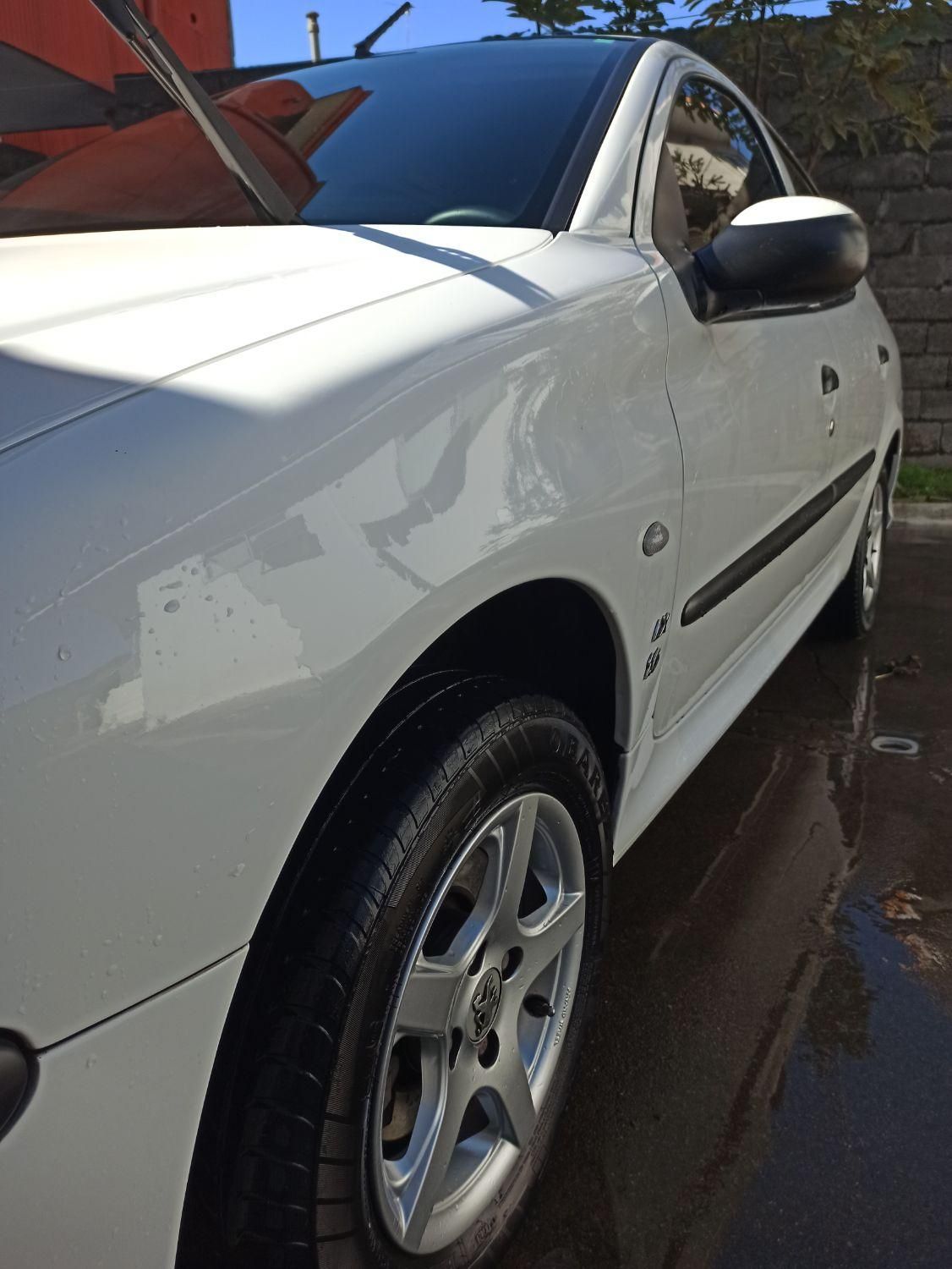 پژو ۲۰۶ صندوق دار v8 - 1399