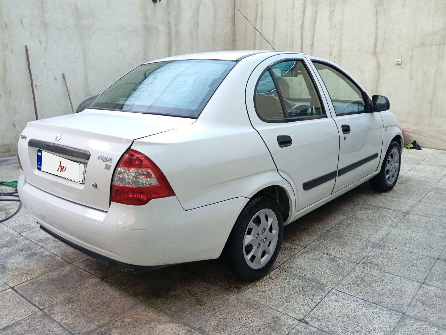 تیبا صندوق دار SX - 1391
