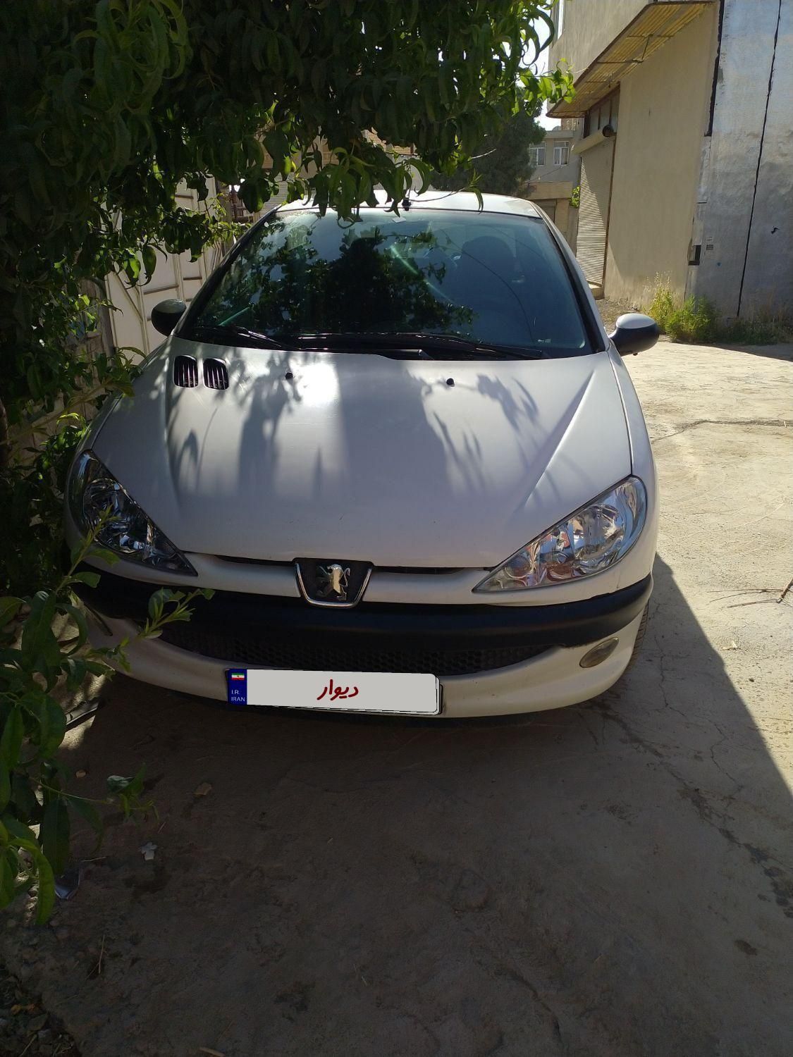 پژو ۲۰۶ صندوق دار v8 - 1392