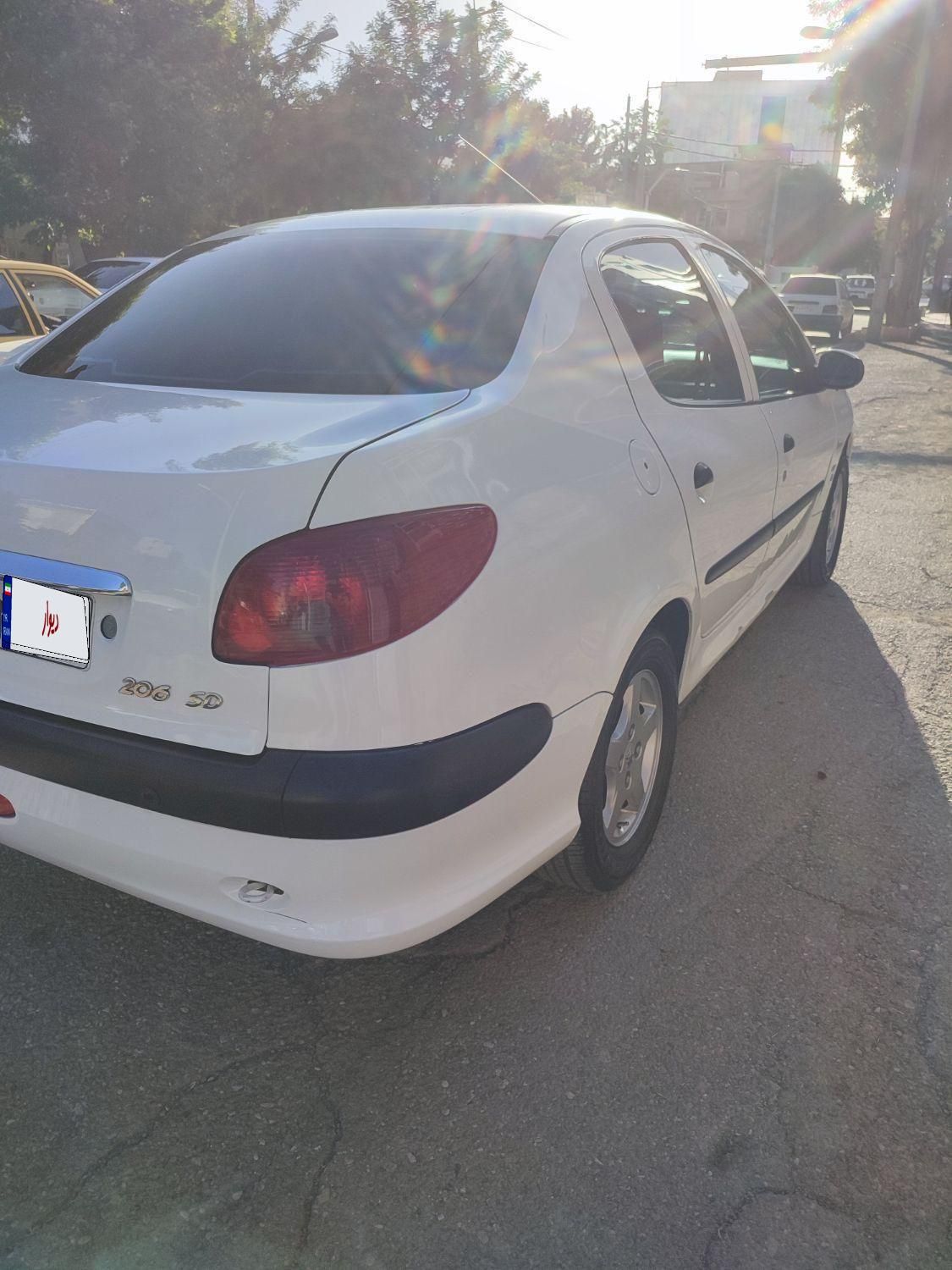 پژو ۲۰۶ صندوق دار v8 - 1397